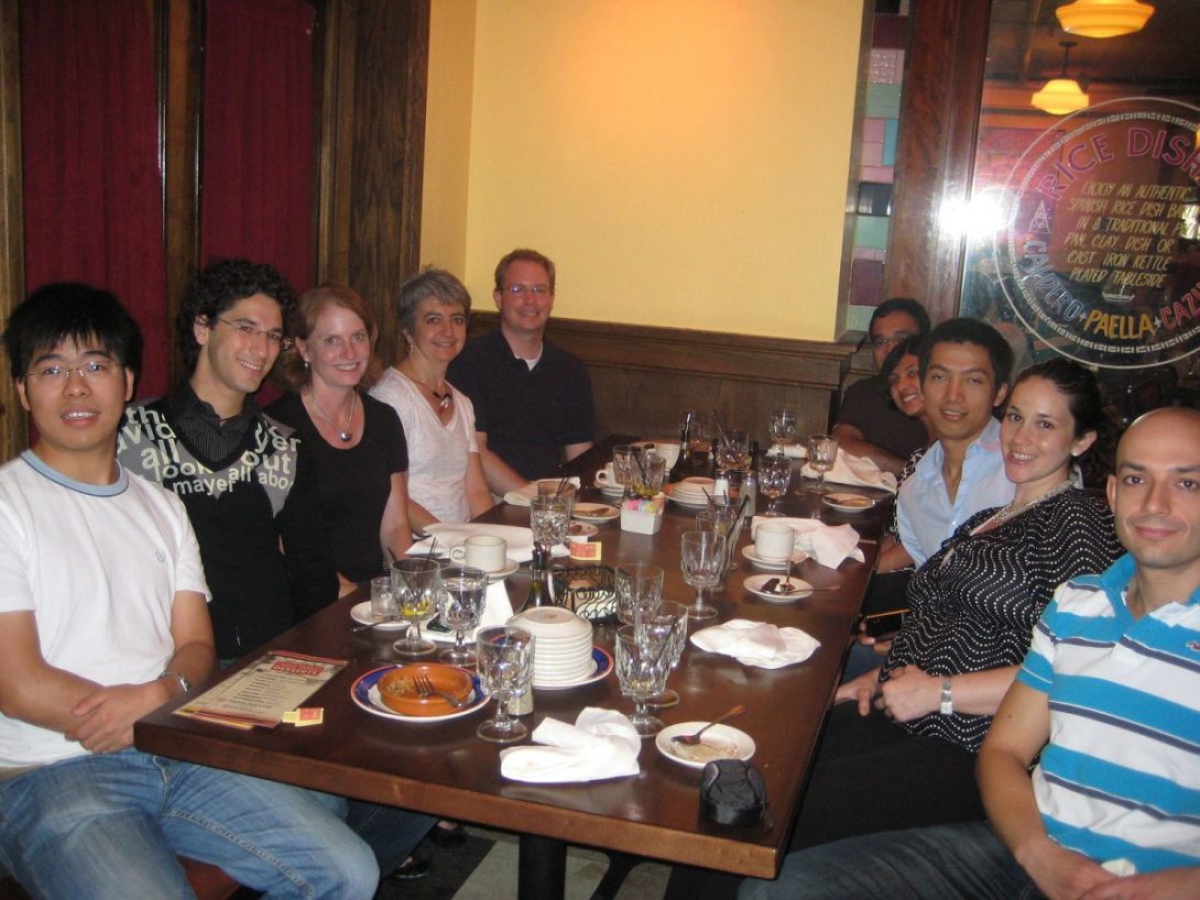 Several NLP Lab members around a table at a restaurant for dinner