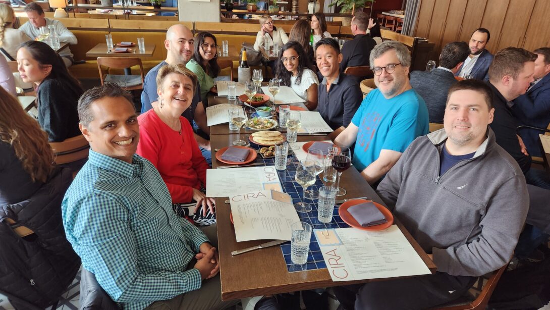 Professor Di Eugenio, David Randolph, 5 NLP lab students and a former student seated at a table for lunch